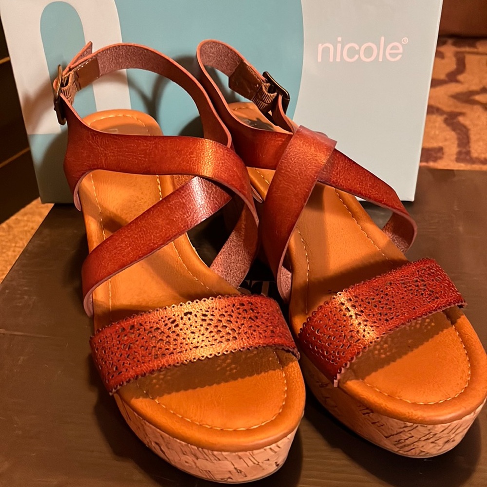 New. In box. Never worn. Nicole brown leather shoes